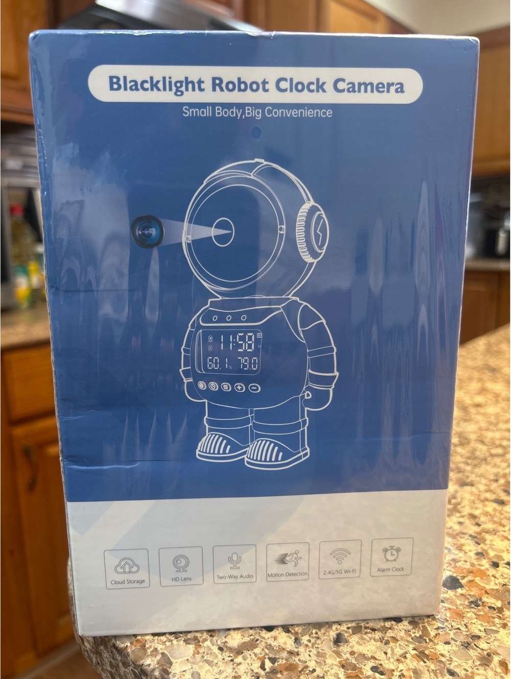 Brand new, factory sealed Blacklight Robot Clock Camera.